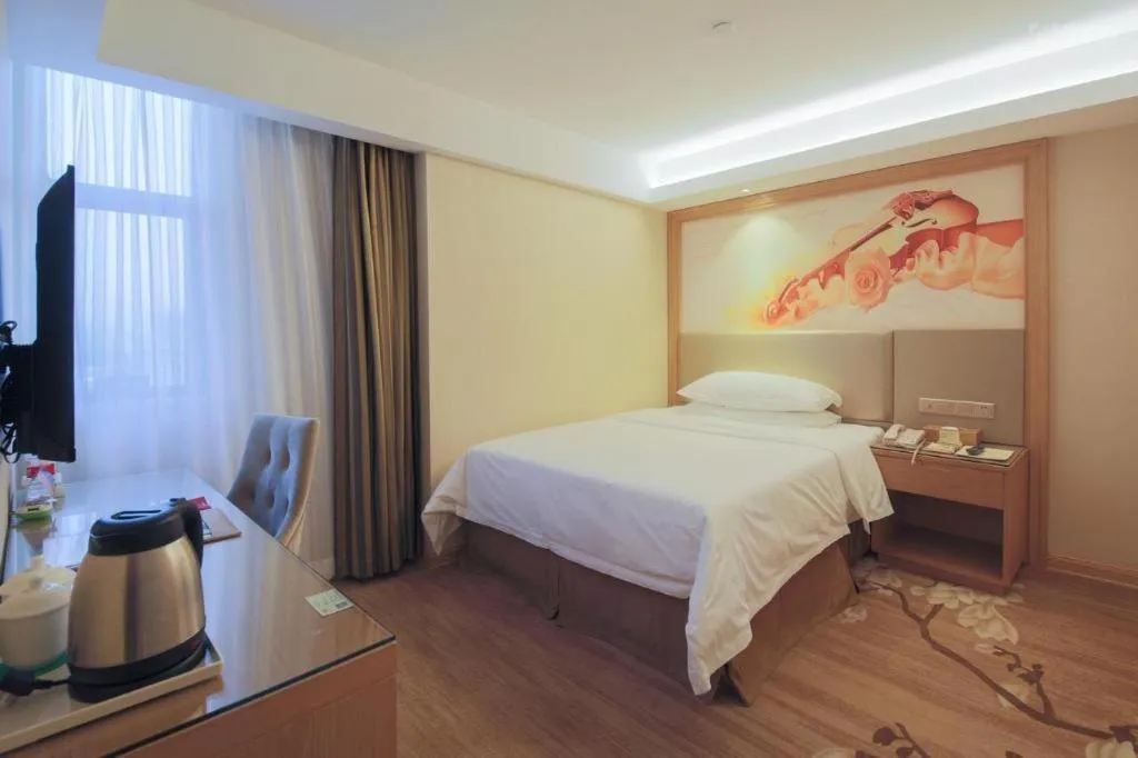 Bed in Vienna Hotel Shenzhen Guanlan Shanshuitianyuan Xintian