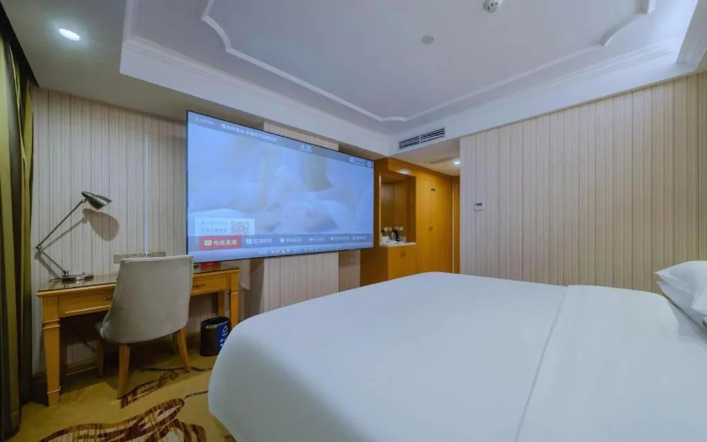 Bed in Vienna Hotel Shenzhen Guanlan Shanshuitianyuan Xintian