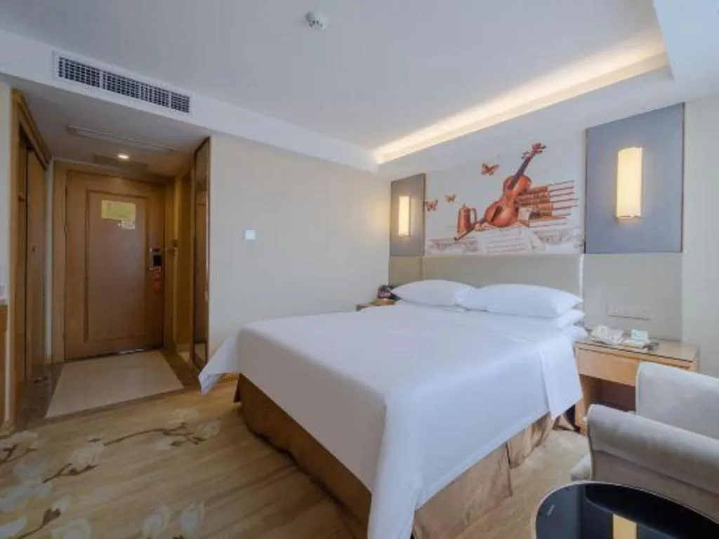 Bed in Vienna Hotel Shenzhen Guanlan Shanshuitianyuan Xintian