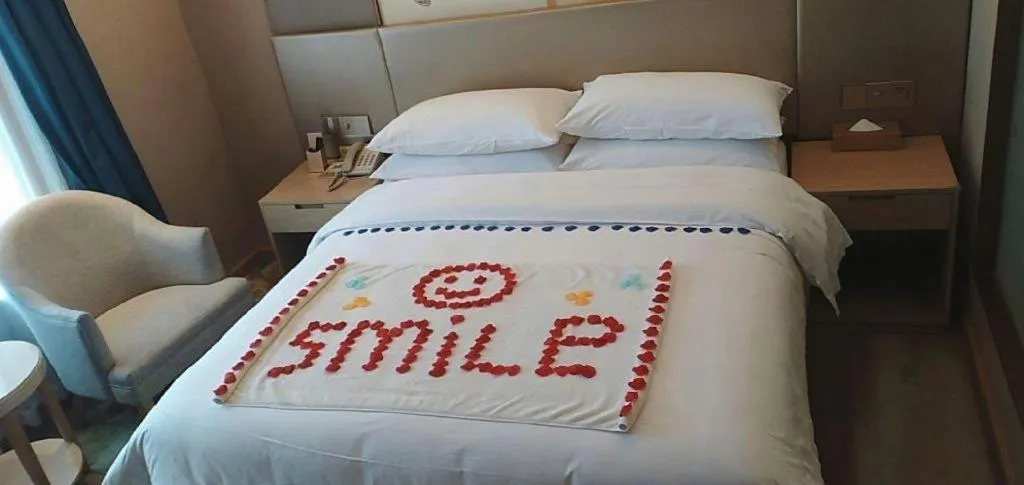 Bed in Vienna Hotel Chengdu Xinjin Old Pier Liujianian Metro Station