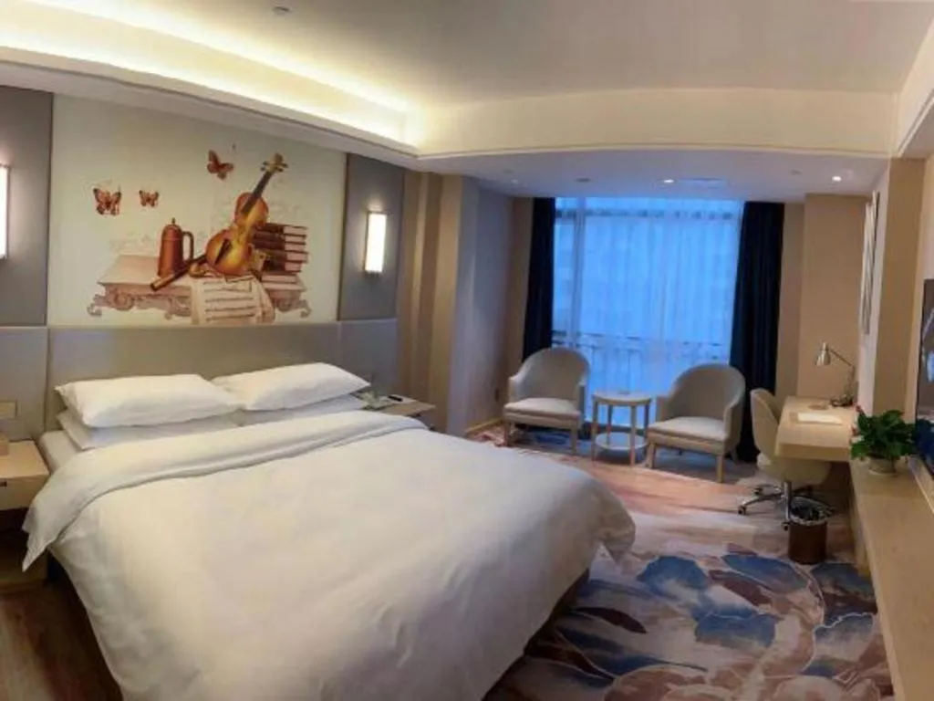 Bed in Vienna Hotel Chengdu Xinjin Old Pier Liujianian Metro Station