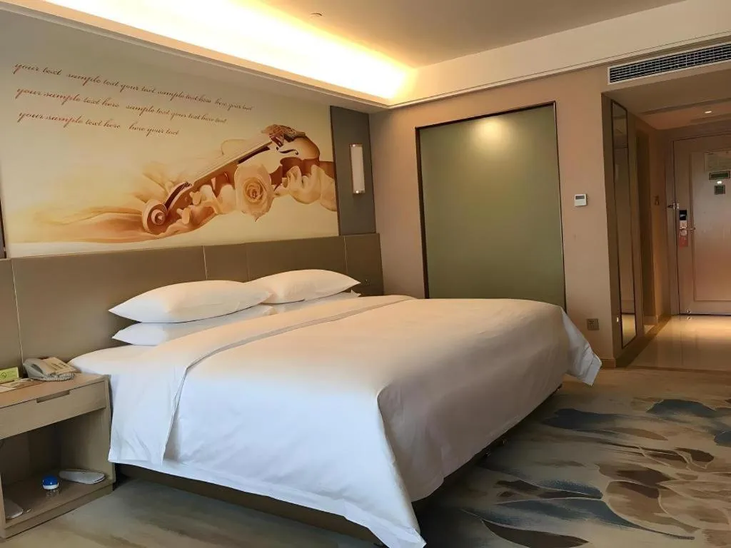 Bed in Vienna Hotel Chengdu Xinjin Old Pier Liujianian Metro Station