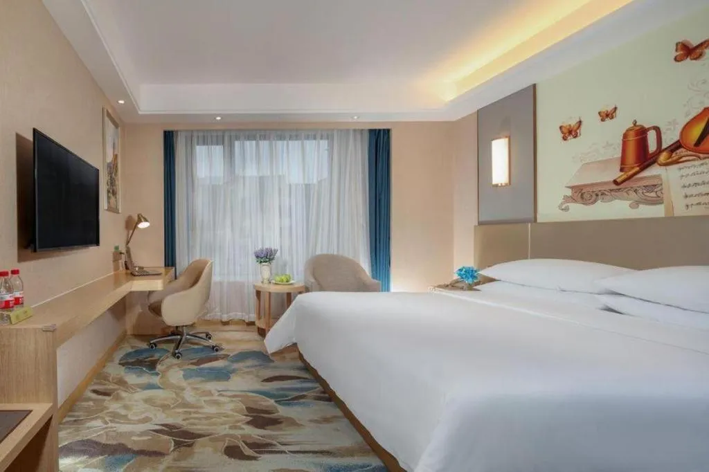 Bed in Vienna Hotel Chengdu Xinjin Old Pier Liujianian Metro Station