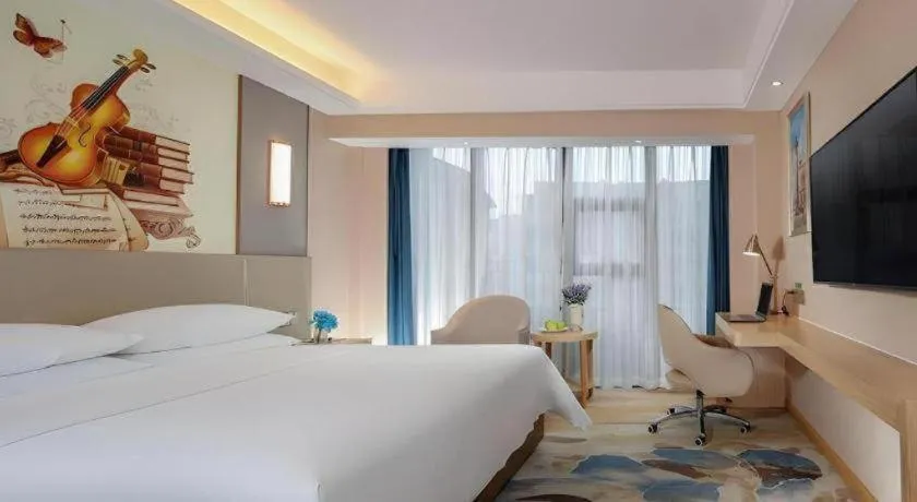 Bed in Vienna Hotel Chengdu Xinjin Old Pier Liujianian Metro Station