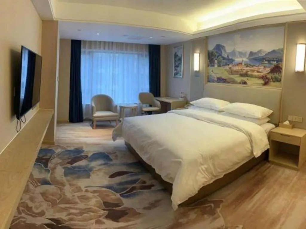 Bed in Vienna Hotel Chengdu Xinjin Old Pier Liujianian Metro Station