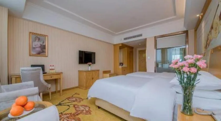 Bed in Vienna Hotel Wuhan Huazhong Normal University Huquan Metro Station