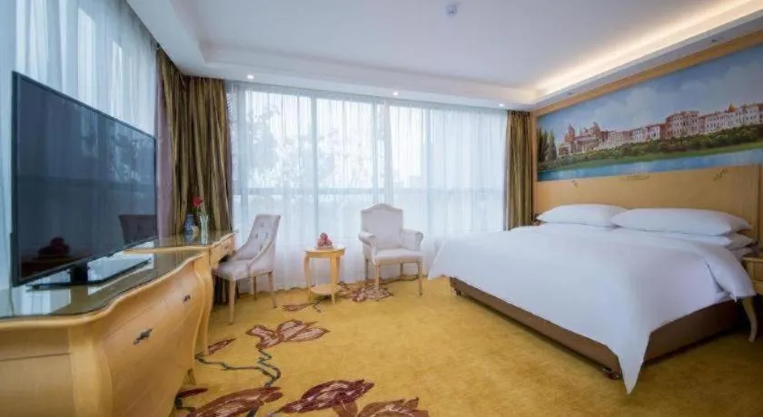 Bed in Vienna Hotel Wuhan Huazhong Normal University Huquan Metro Station