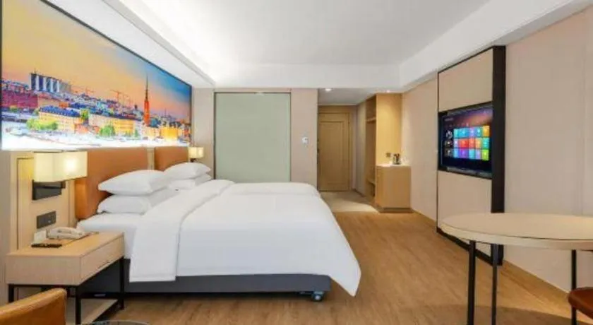 Bed in Vienna Hotel Shandong Jinan High-Tech Wanda Exhibition Center