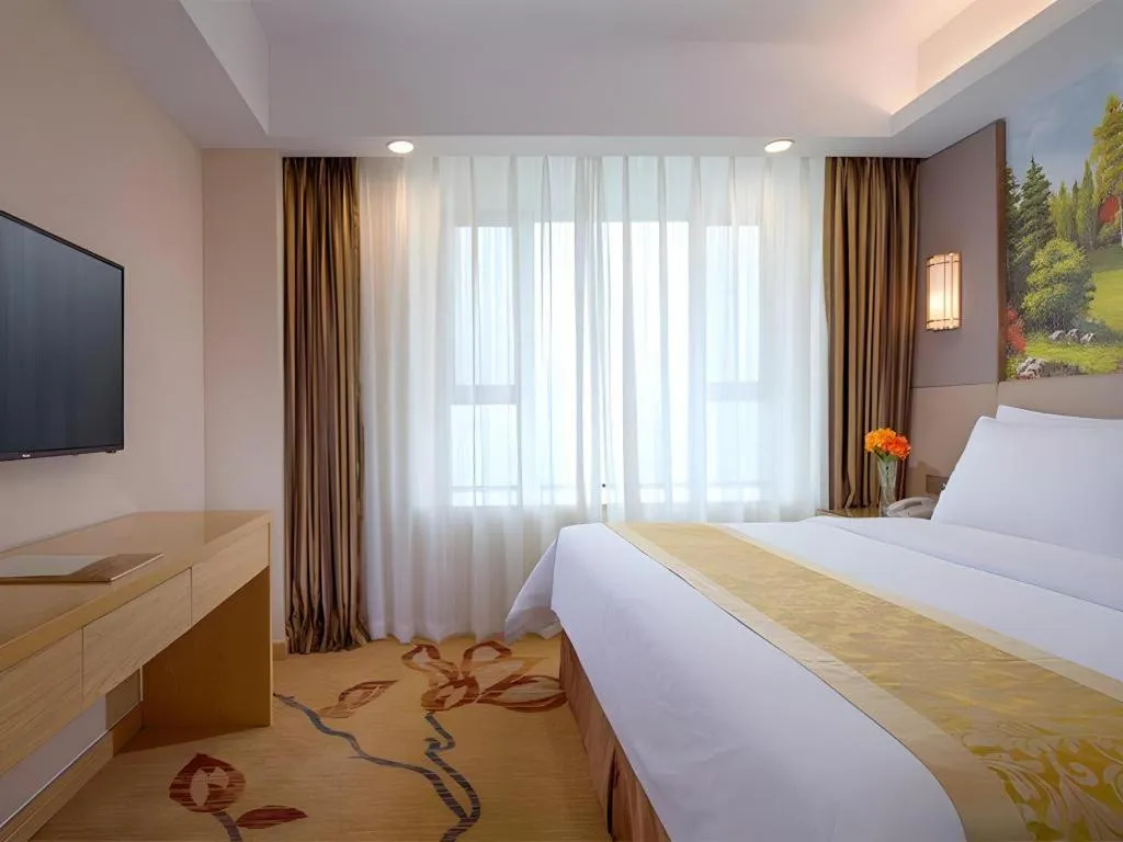 Bed in Vienna Hotel Shandong Jinan High-Tech Wanda Exhibition Center