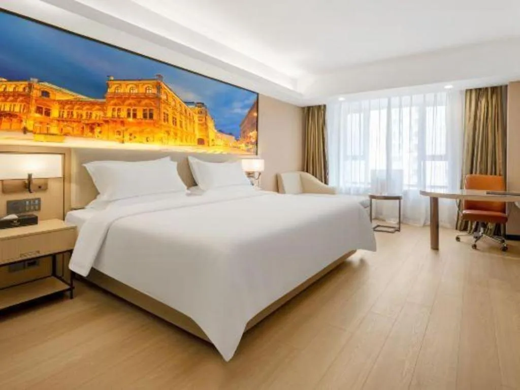 Bed in Vienna Hotel Shandong Jinan High-Tech Wanda Exhibition Center