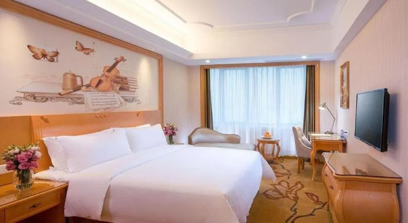 Bed in Vienna Hotel Shandong Jinan High-Tech Wanda Exhibition Center