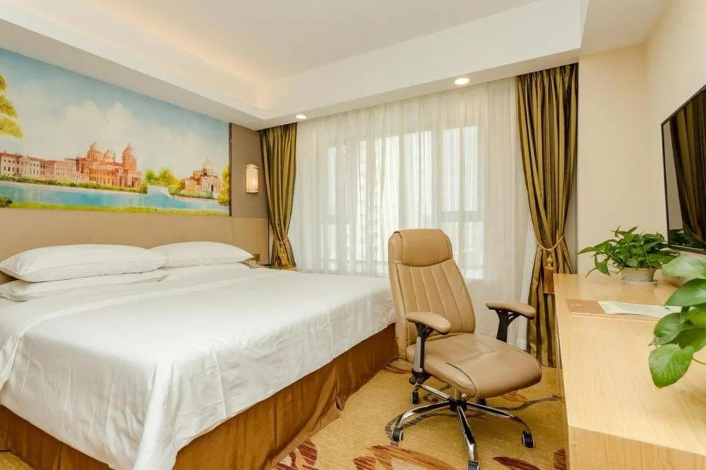 Bed in Vienna Hotel Shandong Jinan High-Tech Wanda Exhibition Center
