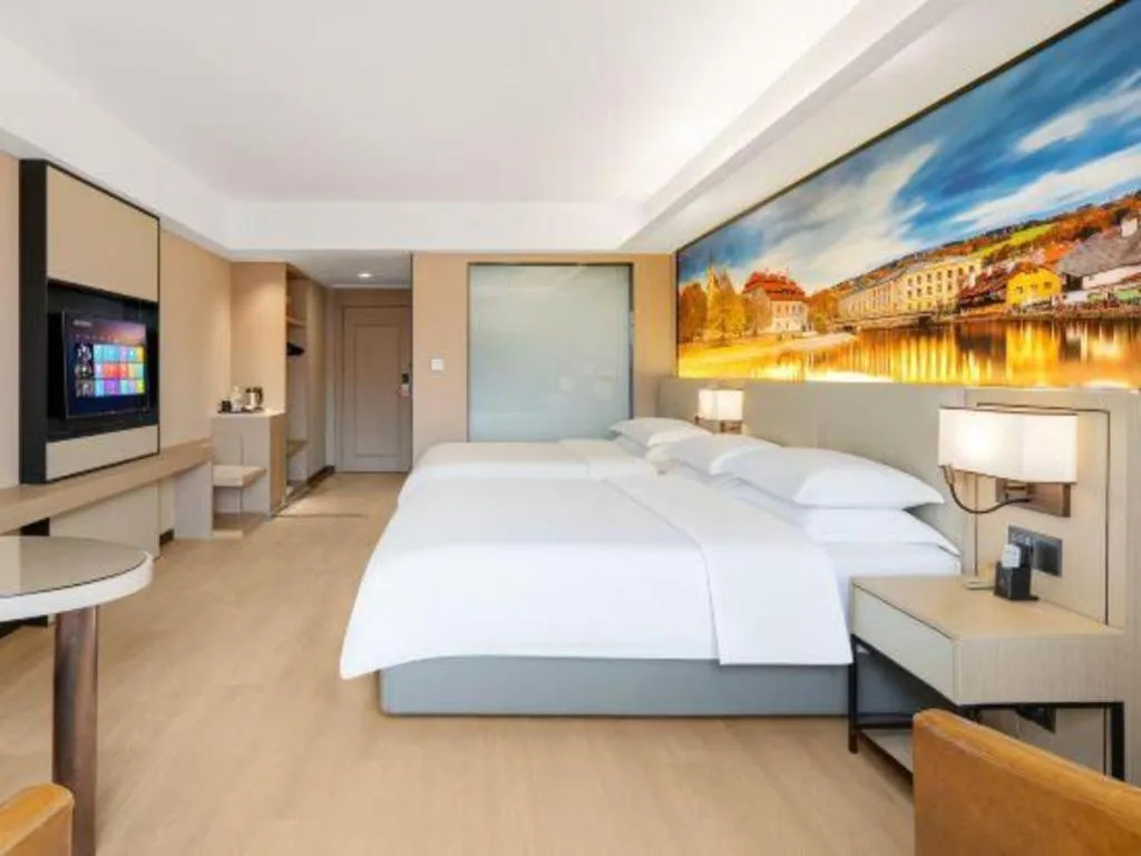 Bed in Vienna Hotel Shandong Jinan High-Tech Wanda Exhibition Center