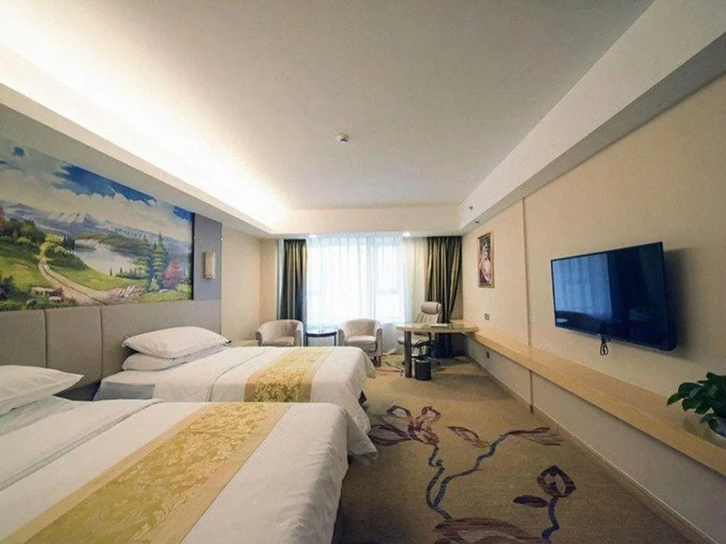Bed in Vienna Hotel Shandong Jinan High-Tech Wanda Exhibition Center