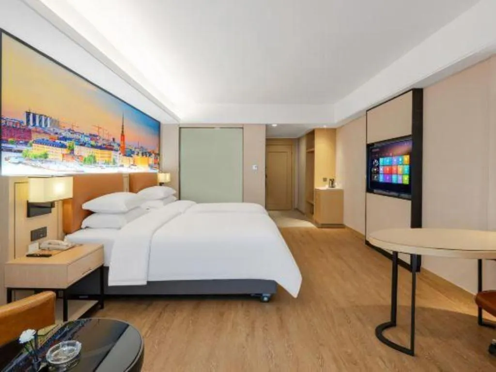 Bed in Vienna Hotel Shandong Jinan High-Tech Wanda Exhibition Center