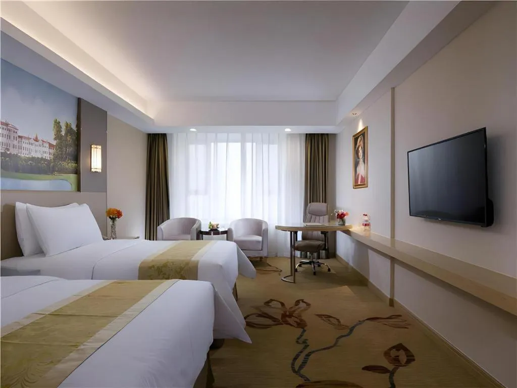 Bed in Vienna Hotel Shandong Jinan High-Tech Wanda Exhibition Center