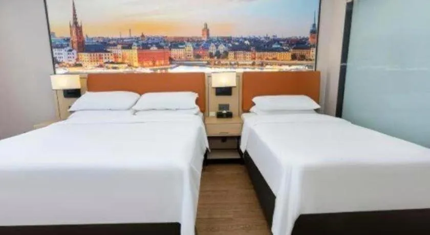 Bed in Vienna Hotel Shandong Jinan High-Tech Wanda Exhibition Center