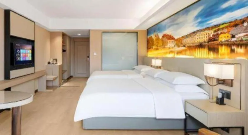 Bed in Vienna Hotel Shandong Jinan High-Tech Wanda Exhibition Center
