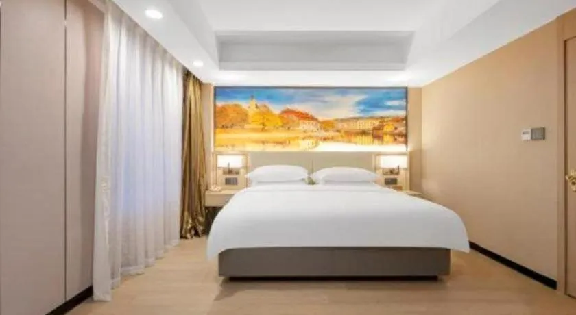 Bed in Vienna Hotel Shandong Jinan High-Tech Wanda Exhibition Center