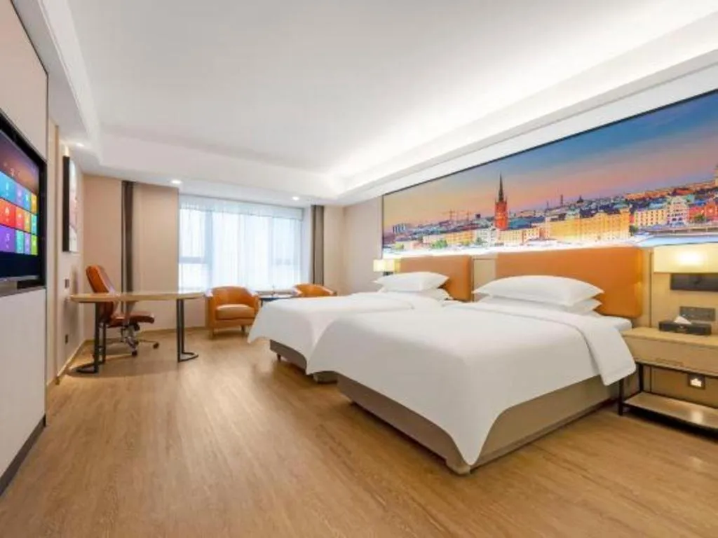 Bed in Vienna Hotel Shandong Jinan High-Tech Wanda Exhibition Center