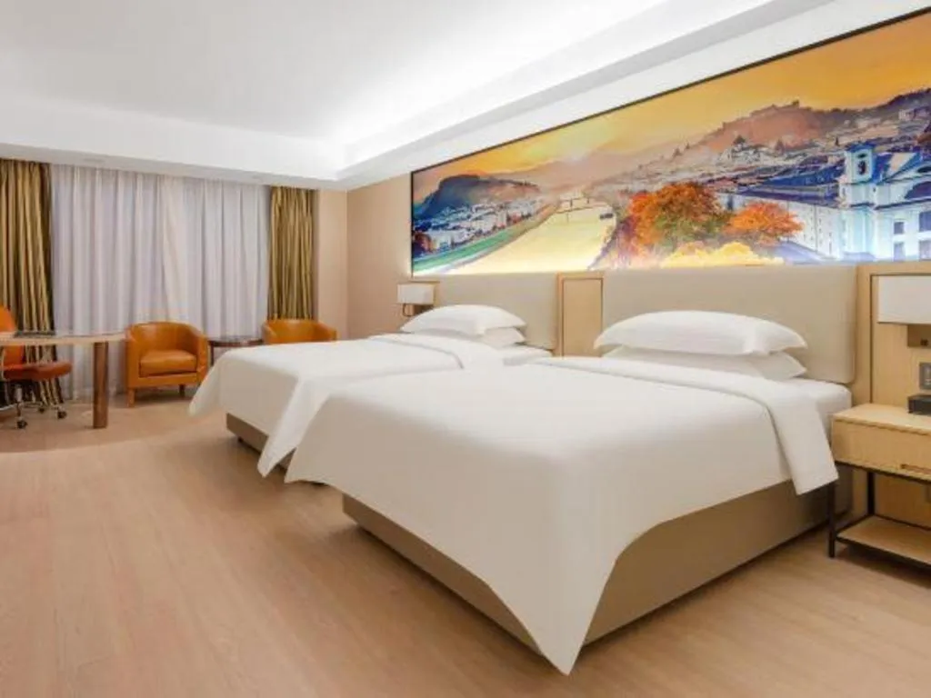 Bed in Vienna Hotel Shandong Jinan High-Tech Wanda Exhibition Center