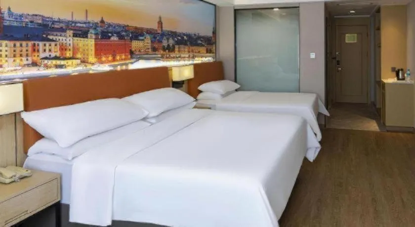 Bed in Vienna Hotel Shandong Jinan High-Tech Wanda Exhibition Center