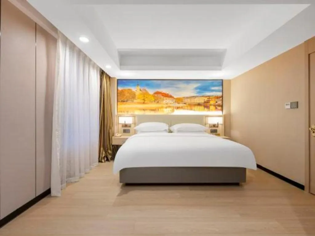 Bed in Vienna Hotel Shandong Jinan High-Tech Wanda Exhibition Center