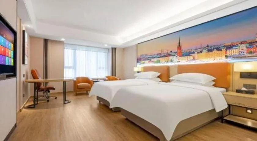 Bed in Vienna Hotel Shandong Jinan High-Tech Wanda Exhibition Center