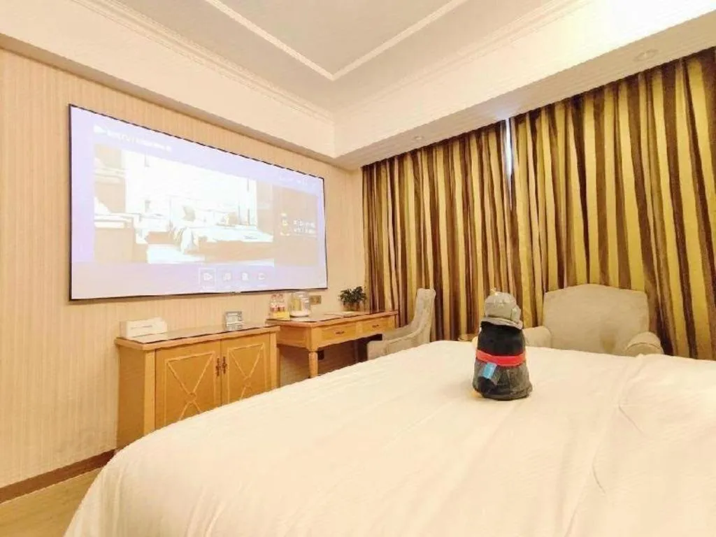 Bed in Vienna Hotel Zhejiang Ningbo Beilun In Time City
