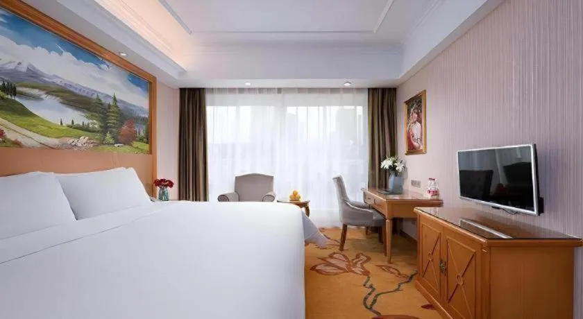 Bed in Vienna Hotel Zhejiang Ningbo Beilun In Time City