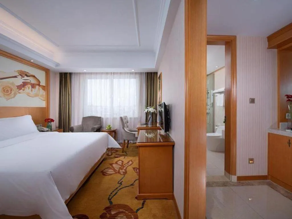 Bed in Vienna Hotel Zhejiang Ningbo Beilun In Time City