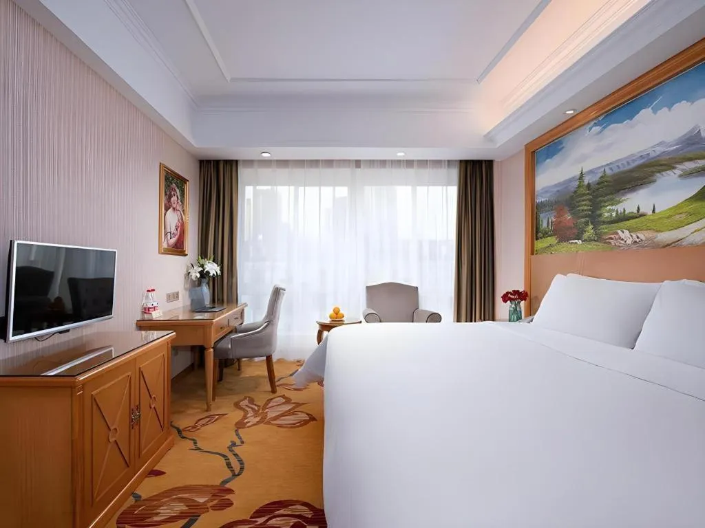 Bed in Vienna Hotel Zhejiang Ningbo Beilun In Time City