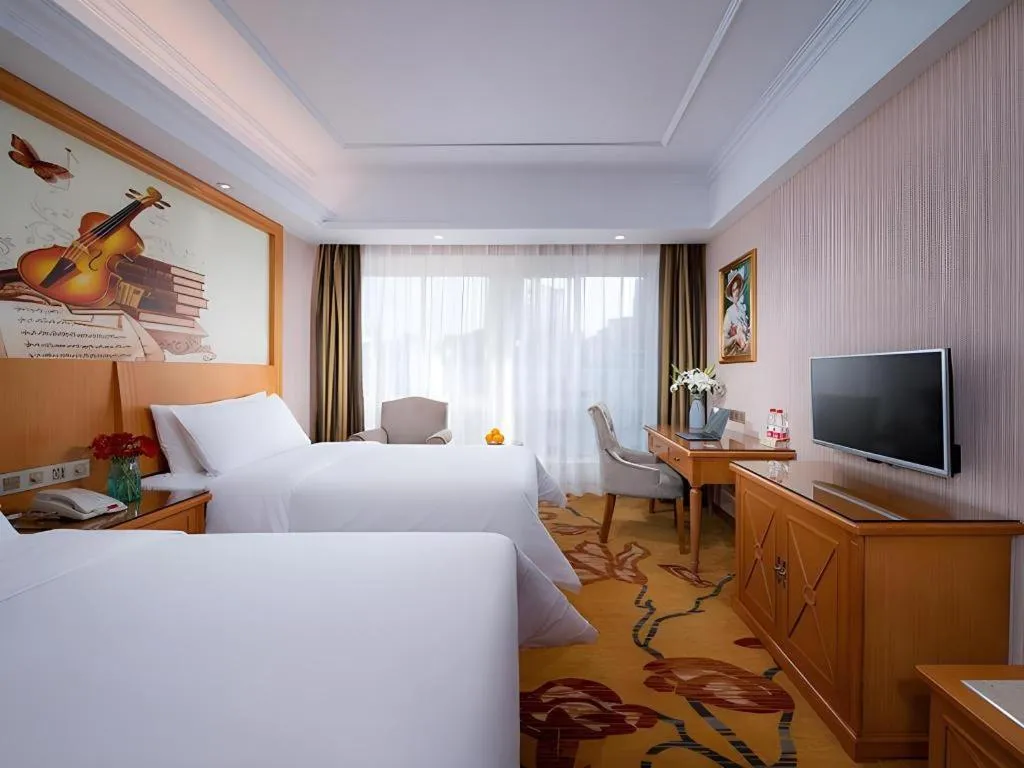 Bed in Vienna Hotel Zhejiang Ningbo Beilun In Time City