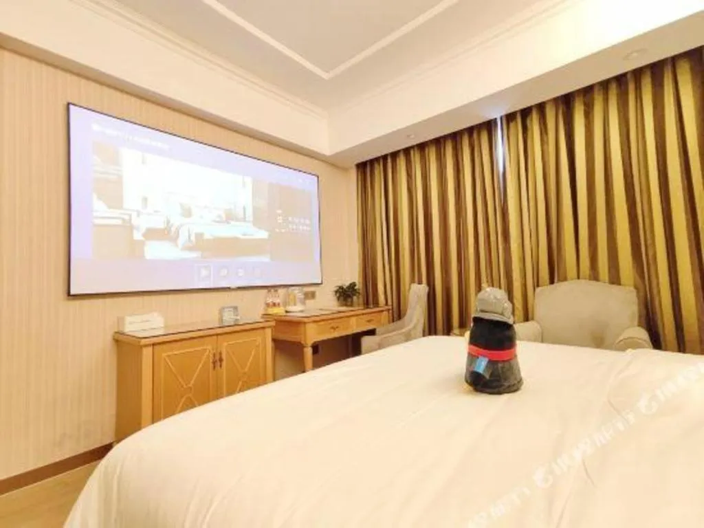 Bed in Vienna Hotel Zhejiang Ningbo Beilun In Time City