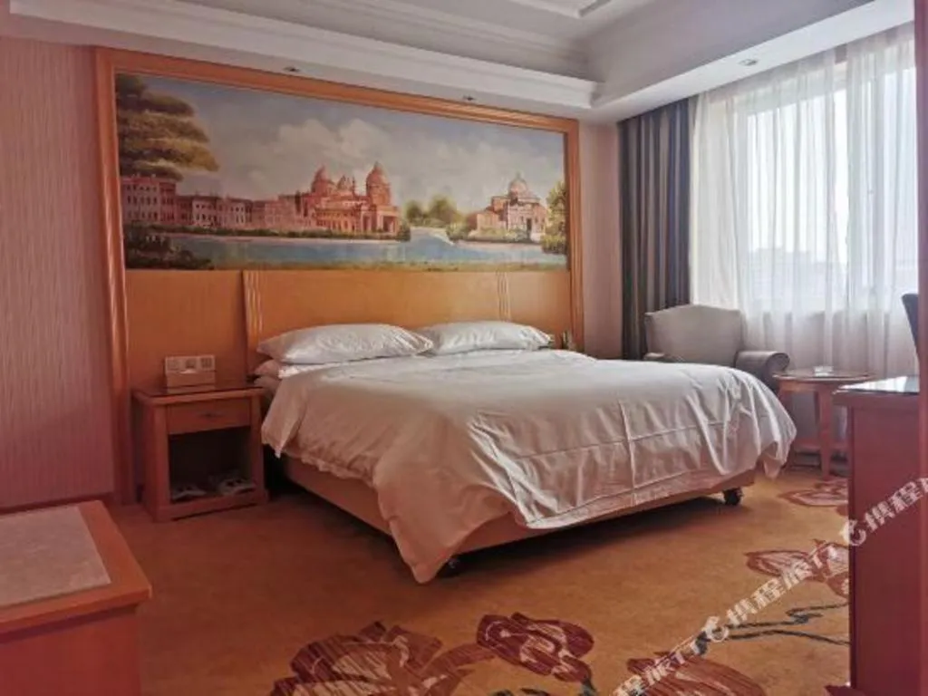 Bed in Vienna Hotel Zhejiang Ningbo Beilun In Time City