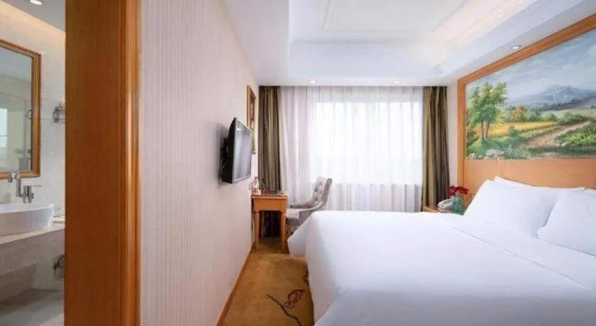 Bed in Vienna Hotel Zhejiang Ningbo Beilun In Time City