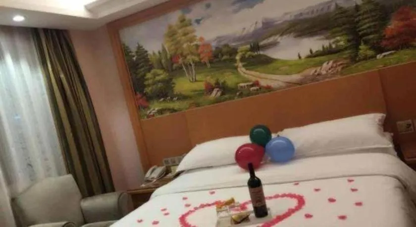 Bed in Vienna Hotel Zhejiang Ningbo Beilun In Time City