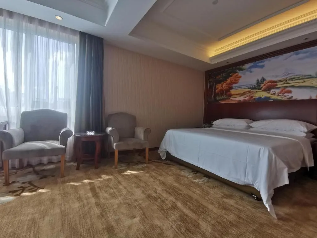 Bed in Vienna Hotel Zhejiang Ningbo Beilun In Time City