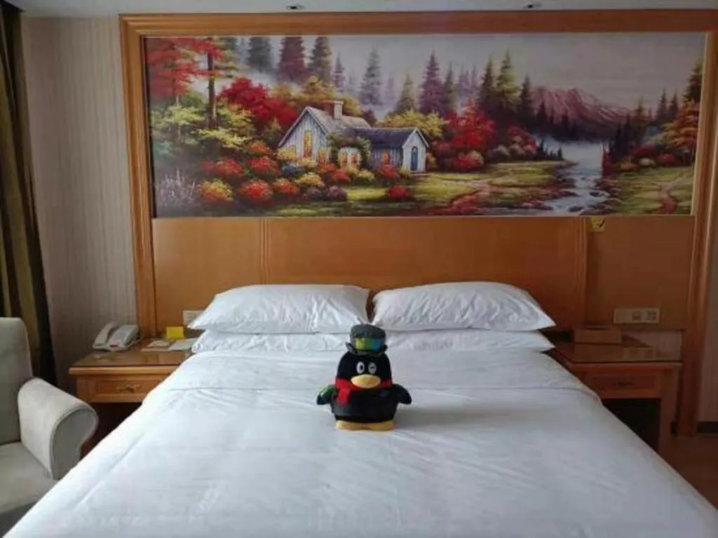 Bed in Vienna Hotel Zhejiang Ningbo Beilun In Time City