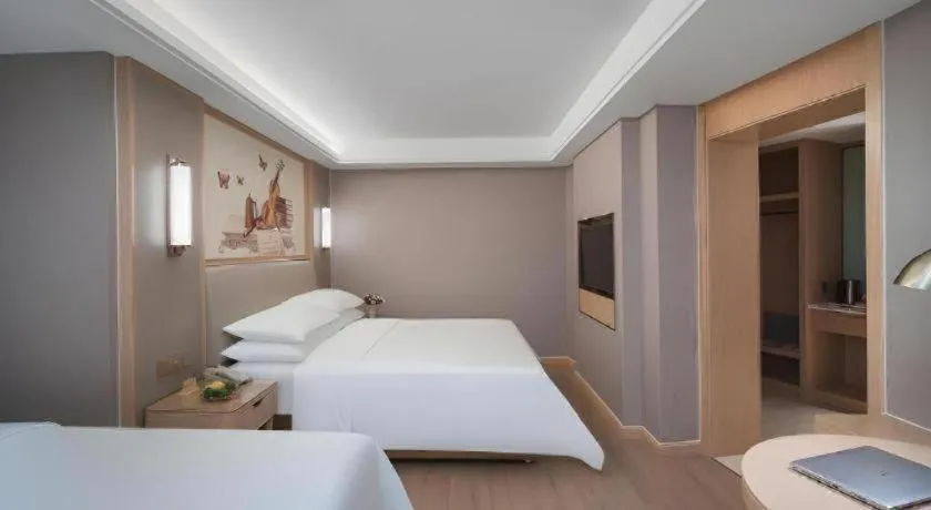 Bed in Vienna Hotel Tianjin Olympic Sports Center Tianta