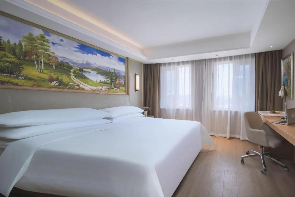 Bed in Vienna Hotel Tianjin Olympic Sports Center Tianta