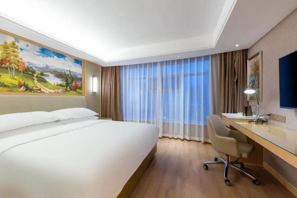 Bed in Vienna Hotel Tianjin Olympic Sports Center Tianta