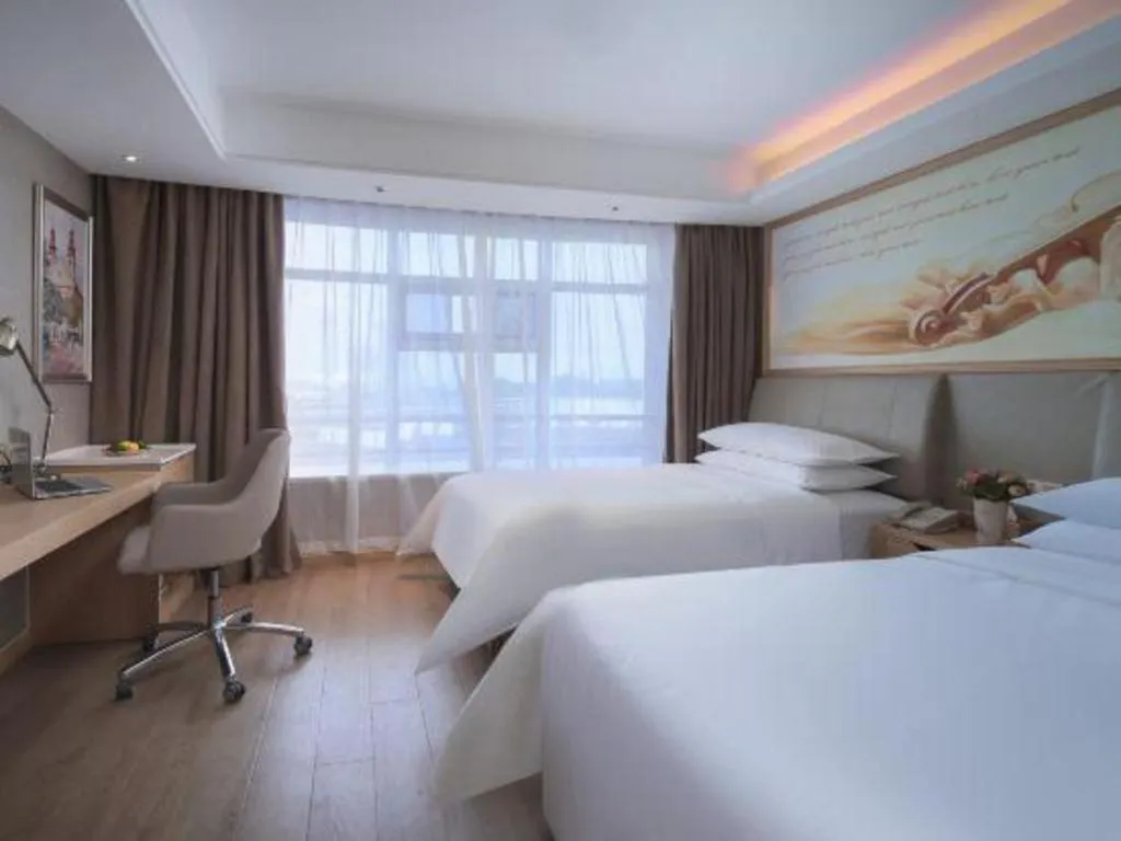 Bed in Vienna Hotel Tianjin Olympic Sports Center Tianta