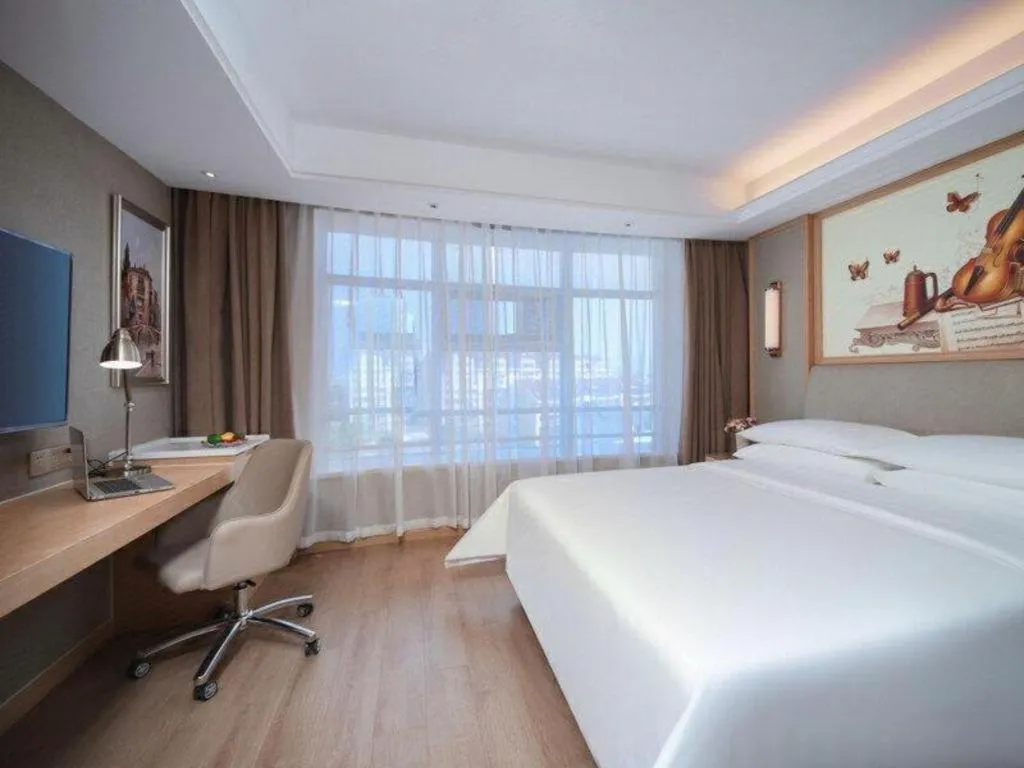 Bed in Vienna Hotel Tianjin Olympic Sports Center Tianta