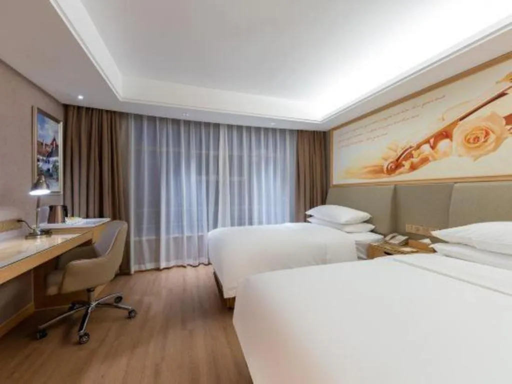 Bed in Vienna Hotel Tianjin Olympic Sports Center Tianta