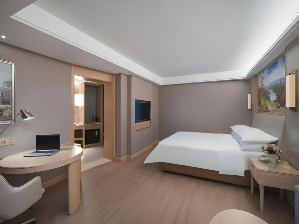 Bed in Vienna Hotel Tianjin Olympic Sports Center Tianta