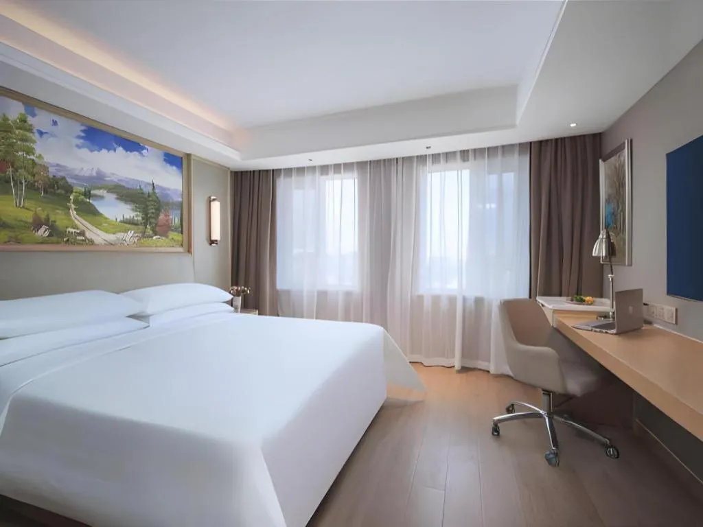 Bed in Vienna Hotel Tianjin Olympic Sports Center Tianta