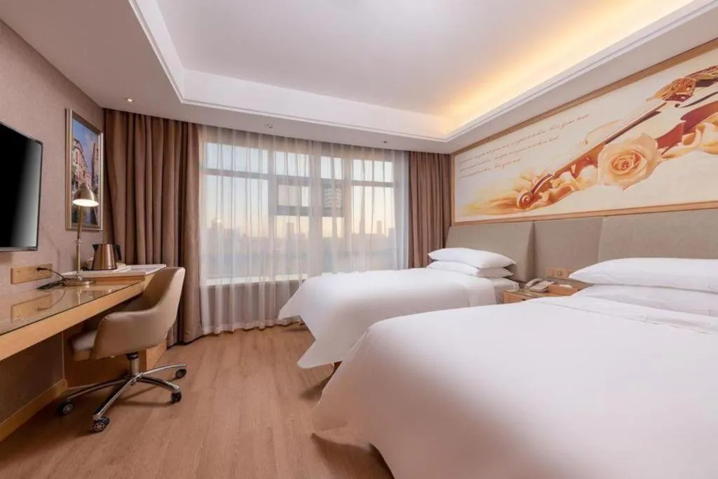 Bed in Vienna Hotel Tianjin Olympic Sports Center Tianta