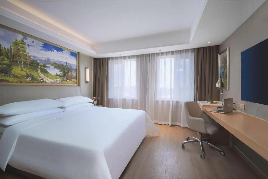 Bed in Vienna Hotel Tianjin Olympic Sports Center Tianta