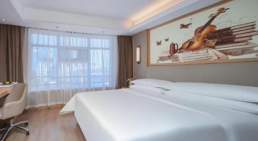 Bed in Vienna Hotel Tianjin Olympic Sports Center Tianta